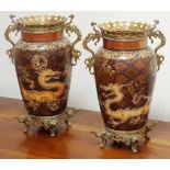 An unusual pair of 19th century enamelled and brass mounted two-handled Vases,