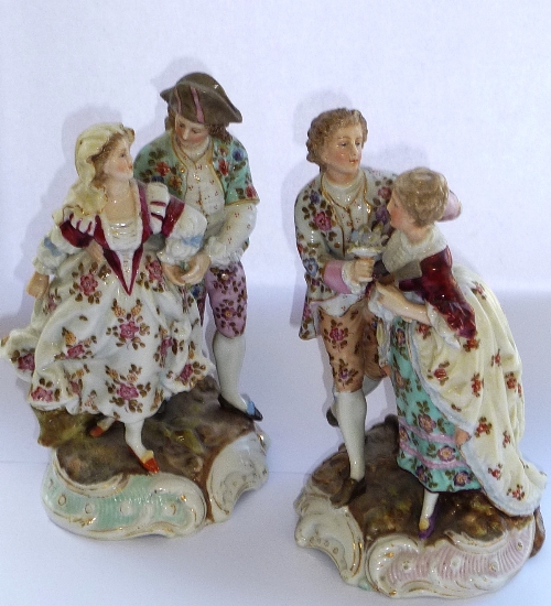 A pair of late-19th century Continental hand-decorated porcelain Figure Models,