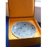 A boxed Chinese 19th century porcelain Dish hand-decorated in underglaze blue with scrolling lotus