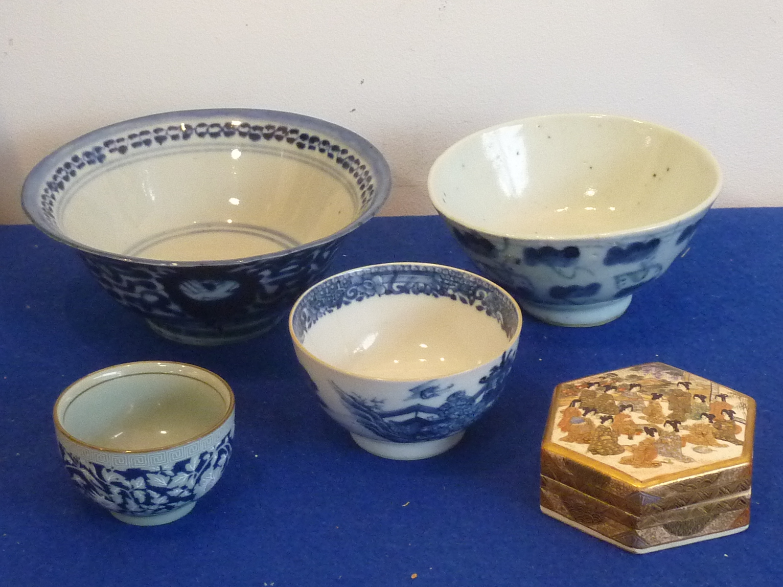 A small Oriental ceramics group to include Tea Bowls, one earlier Bowl with stylised decoration,