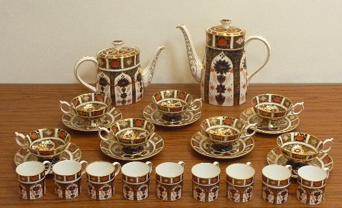 A Royal Crown Derby Tea/Coffee Service hand gilded and decorated in the 1128 Imari pattern,