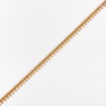 COLLIER DRAPERIEcomposé d'une frise articulée de motifs polylobés. Monture en or jaune 18K.Poids