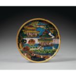 MIROIR CIRCULAIREen alliage de cuivre doré et émaux cloisonnés polychromes, à décor d'un jardin