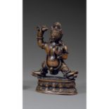 STATUETTE DE VAJRAPANIen alliage de cuivre de patine sombre, représenté en pratyalidha sur un