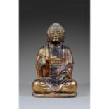 GRANDE STATUETTE DE BOUDDHAen bois laqué et doré, représenté assis en vajrasana, vêtu de la robe