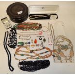 A quantity of costume jewellery including bead necklaces, enamel and marcasite dog brooch; other