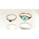 A Victorian, unmarked gold ring, set with six cabouchon turquoise in a flower head form, with