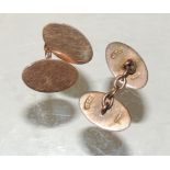A pair of Gents 9ct gold cufflinks, the oval panels un-engraved. 9g approx.