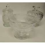 A heavy cut crystal pedestal bowl, 14.5cms high; a cut glass bon bon dish and cover and another