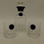 A silver mounted cut glass spirit decanter with stopper and together with two matching small