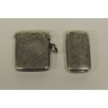 A Victorian silver vesta case with etched foliate decoration, Chester c.1897 together with another