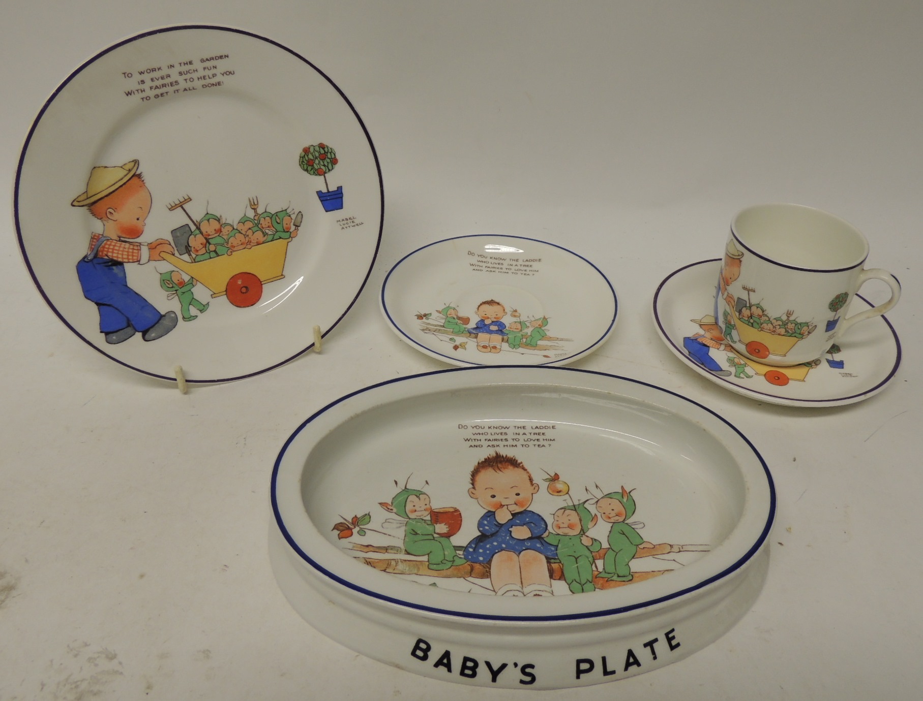 Shelley Mabel Lucie Attwell nursery porcelain - a Baby's Plate' cup and two saucers and a small
