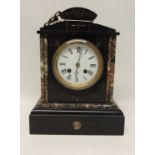 A Victorian mantel clock in architectural marble and black slate case, having white enamel dial with