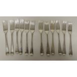 A set of six silver dessert forks, London 1912, 6.7oz together with a similar set of six silver