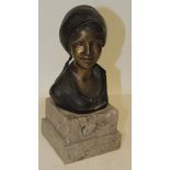 After Giovanni De Martino a small bronze bust of a smiling woman in a headscarf mounted on a stepped