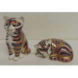 A Royal Crown Derby Imari paperweight sleeping cat, gold stopper, 4cms high together with another