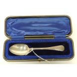 A cased silver Christening spoon with engraved decoration approx 1.16oz