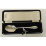 A cased silver spoon approx .5oz