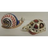 A Royal Crown Derby Imari paperweight tortoise, no stopper, 12cms long and a snail, no stopper,