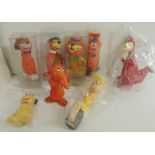 Eight small rubber "squeezy" figures including Dino and Yogi Bear (8) ++good