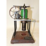 A model of a Rider Ericsson hot air pumping engine stamped "Rider Ericsson Sterling Stirling" to the