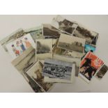A quantity of assorted loose postcards including photo topo Butlins Bognor Regis c.1965; Slapton