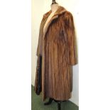 A long mink fur coat labelled "Davidson's Chestnut Natural Mink" with initialled and embroidered