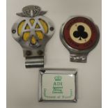 A Jersey AA car bumper badge; a Shirley & District Motor Club badge and an Approved Driving