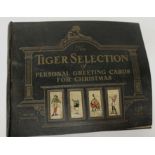 A 1911 Trade sample selection of greetings cards in album "The Tiger Selection of Personal Greetings