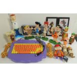 A modern The Flintstones computer keyboard; four "cut-out" painted wood Flintstone figures; hard