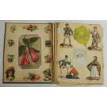 An Edwardian scrap book album containing col litho scraps and greetings cards glued to the pages