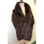 A dark mink fur stole together with a silver fox fur shoulder wrap (2) ++both good condition