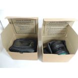 Two WWII period gas masks in original cases, unused (2)
