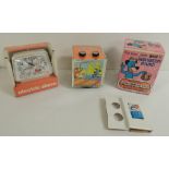 A Solid State revolving photo cube radio Huckleberry Hound in original box with original battery