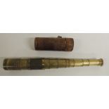 A late 19th/early 20th Century 8-draw brass telescope, un-named, with extending lens shield and