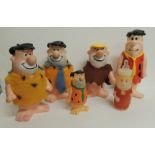 THE FLINTSTONES - three plastic money boxes moulded as Fred, another as Barney all c.1970's; an