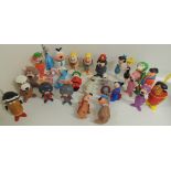 Twenty six small plastic cartoon figures c.1960's including Ally Gator, Tom Tommino, Clopper,