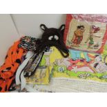 The Flintstones ladies scarf c.1994; a vintage Flintstones cushion; a Huckleberry Hound pillow