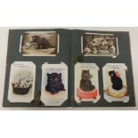 An album of approx. 102 postcards mostly related to cats including Louis Wain; dogs including Bonzo;