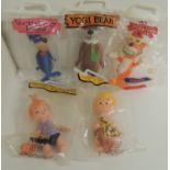 Four Dakin character figures - Yogi Bear, Huckleberry Hound, Bamm-Bamm and Pebbles all in original