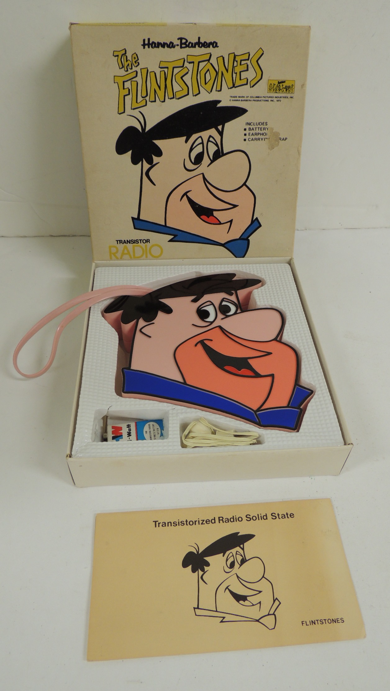 The Flintstones - a Solid State transistor radio in the form of Fred Flintstone in original box with