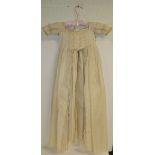 An Edwardian babies Christening gown with overdress and petticoat with stiffened skirt and cream