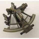 An early 20th Century sextant by Henry & Barrow Co London having white metal engraved scale, brass