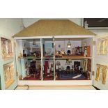 A LARGE DOLLS HOUSE REPLICA OF THE LITTLE WHITE COTTAGE, FALMOUTH home to Howard and Marion Spring -