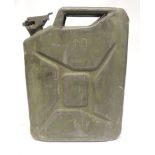 A military jerry can, painted green and impressed "WD 1966 RTB" to one side