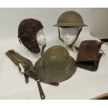 A brown leather flying helmet with chamois leather lining and webbing chin strap; a WWII metal