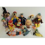 A collection of Ideal characters all with felt clothing and moulded rubber heads, some with bendy