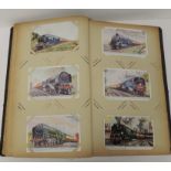 An album of approx 131 assorted postcards including artist cards of steam trains Alan Anderson;