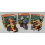 MARX TOYS (Japan) - clockwork tinplate and celluloid Flintstone Tricycles: Wilma, Fred and Dino,