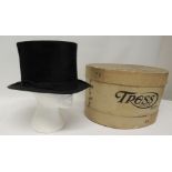 A Christy's, London black silk top hat 20.5cms x 16.5cms in Tress Hats cardboard box ++some slight